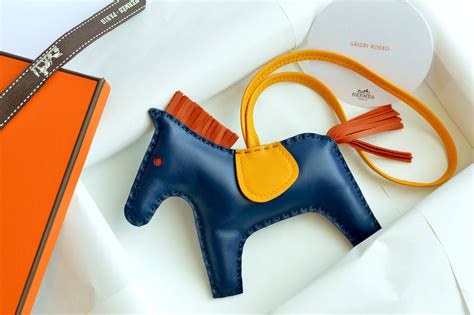 hermes dog charm|Hermes rodeo bag charm.